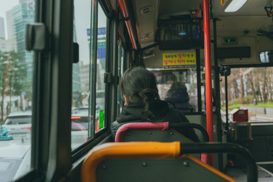 View from inside a Seoul city bus, capturing urban life and street scenes.