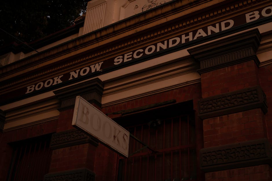Vintage facade of a secondhand bookstore with architectural details.